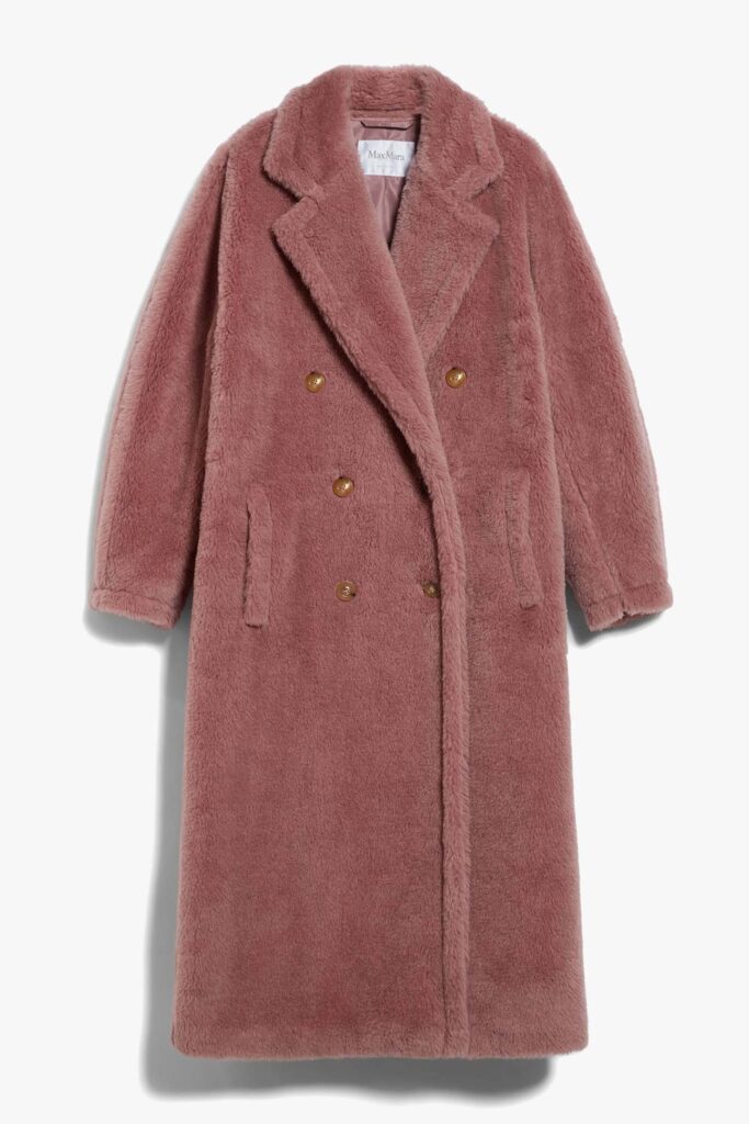a pink coat with gold buttons